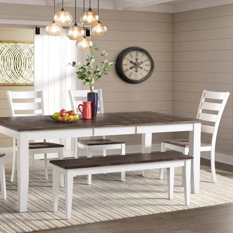 Gray and white backless bench with wooden chairs